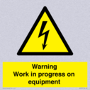 warning-work-in-progress-on-equipmentwith-electrical-hazard-symbol~